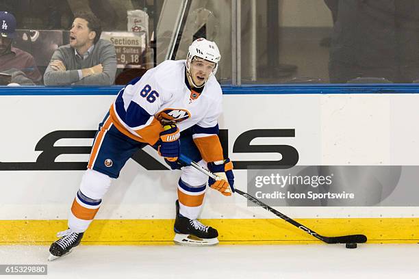 New York Islanders Left Wing Nikolay Kulemin during the third period of opening night at Madison Square Garden in a NHL game between the New York...