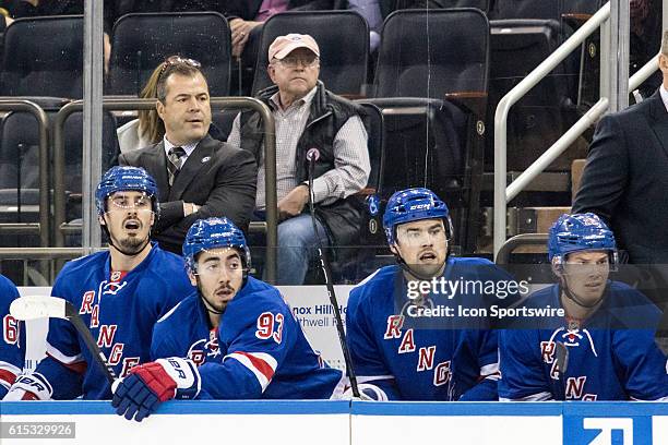 New York Rangers Head Coach Alain Vigneault watches on as the Sharks works in the Rangers zone during the first period of a NHL game between the San...