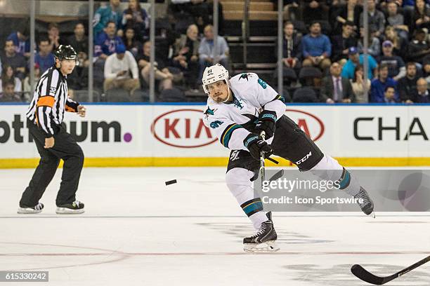 San Jose Sharks Defenseman Justin Braun sends the puck down into the Rangers zone during the third period of a NHL game between the San Jose Sharks...