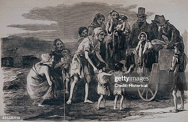 Mrs Kennedy gives clothing to victims of the Irish Famine, at Kilrush, Ireland, 1849.