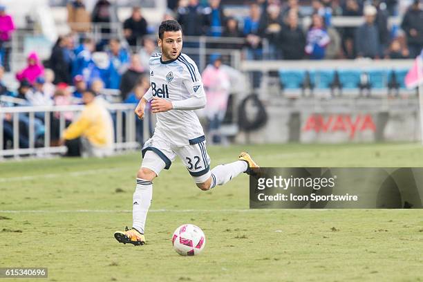 Vancouver Whitecaps player Marco Bustos brings the ball up the field during the Major League Soccer game between the Vancouver Whitecaps and the San...