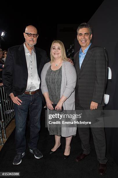 Producers Kem Nunn, Alexandra Cunningham and Michael London arrive at the premiere of Hulu's 'Chance' at Harmony Gold Theatre on October 17, 2016 in...