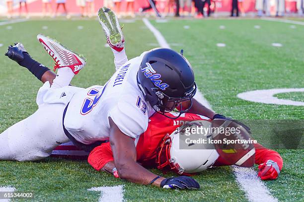 Tulsa Golden Hurricane safety Jordan Mitchell breaks up a pass intended for Houston Cougars wide receiver Isaiah Johnson during the Tulsa Golden...