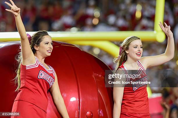 Houston Cougar cheerleaders during the Tulsa Golden Hurricanes at Houston Cougars game at TDECU Stadium, Houston, Texas.