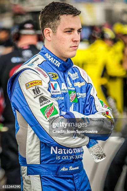 Sprint car driver, Alex Bowman , looks on prior to qualifying for the NASCAR Sprint Cup Series Bad Boy Off Road 300 at New Hampshire Motor Speedway...