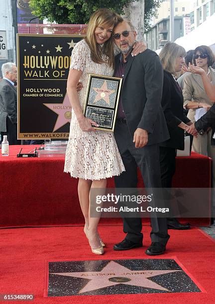 Actor Richard Schiff and actress Allison Janney at the Star ceremony held On The Hollywood Walk Of Fame on October 17, 2016 in Hollywood, California.