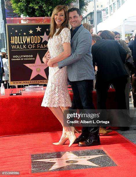 Actress Allison Janney and Philip Joncas at the Star ceremony held On The Hollywood Walk Of Fame on October 17, 2016 in Hollywood, California.