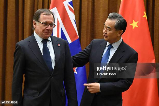 Murray McCully, Foreign Minister of New Zealand and Wang Yi, Foreign Minister of China are seen ahead of their meeting on October 18, 2016 in...
