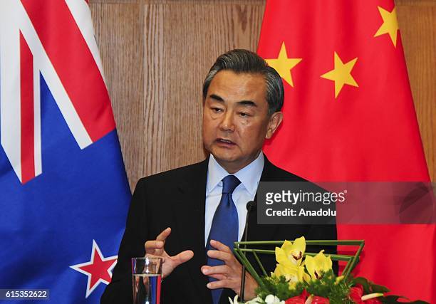 Chinese Foreign Minister Wang Yi speaks during a joint press conference with Foreign Minister of New Zealand, Murray McCully in Beijing, China on...
