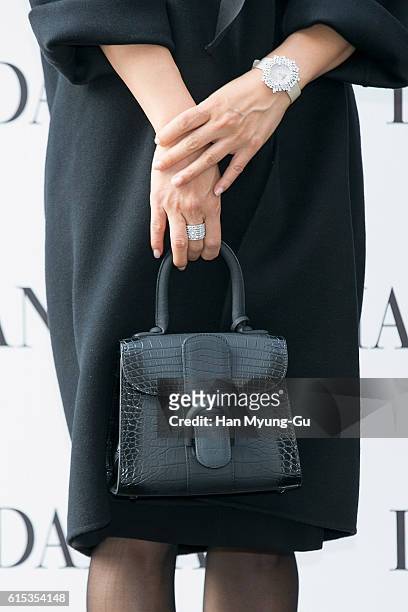South Korean actress Kim Hee-Ae, bag detail, attends the photocall for "DAMIANI" on October 18, 2016 in Seoul, South Korea.
