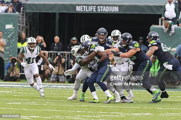 Defensive Lineman Steve McLendon of the New York Jets makes a stop against the Seattle Seahawks during their game at MetLife Stadium on October 2,...