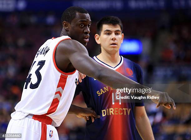 Pascal Siakam of the Toronto Raptors defends during a NBA preseason game against San Lorenzo de Almagro at Air Canada Centre on October 14, 2016 in...