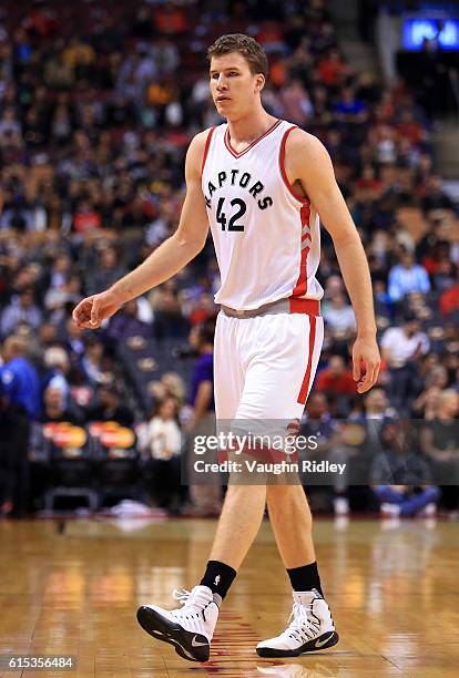 Jakob Poeltl of the Toronto Raptors looks on during a NBA preseason game against San Lorenzo de Almagro at Air Canada Centre on October 14, 2016 in...