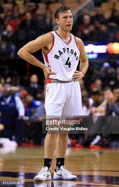 Brady Heslip of the Toronto Raptors looks on during a NBA preseason game against San Lorenzo de Almagro at Air Canada Centre on October 14, 2016 in...