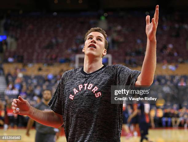 Jakob Poeltl of the Toronto Raptors warms up prior to an NBA preseason game against San Lorenzo de Almagro at Air Canada Centre on October 14, 2016...