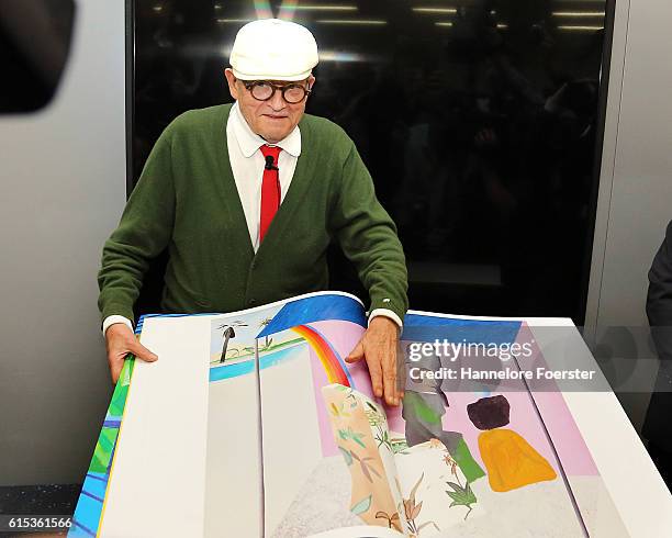 David Hockney shows his 2000 Euro "David Hockney sumo" book, during the opening press conference of the 2016 Frankfurt Book Fair on October 18, 2016...