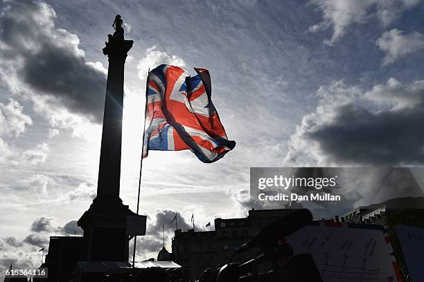 The Great Britain flag is lofted in the air during the Olympics & Paralympics Team GB - Rio 2016 Victory Parade at Trafalgar Square on October 18,...