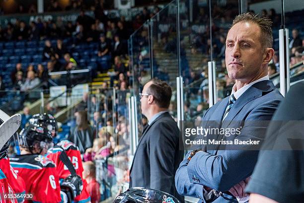 Former NHL player and head coach of the Kelowna Rockets, Jason Smith, stands on the bench against the Saskatoon Blades on October 14, 2016 at...