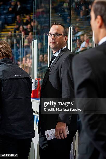 Assistant coach, Kris Mallette of the Kelowna Rockets stands on the bench against the Saskatoon Blades on October 14, 2016 at Prospera Place in...