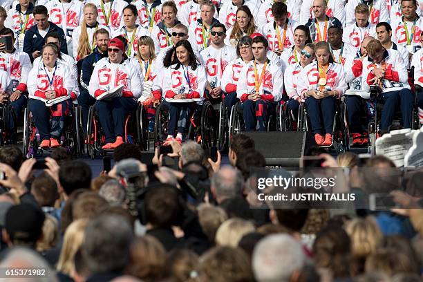 British athletes gether during the Olympics and Paralympics Team GB Rio 2016 Victory Parade in Trafalgar Square in London on October 18, 2016. A...