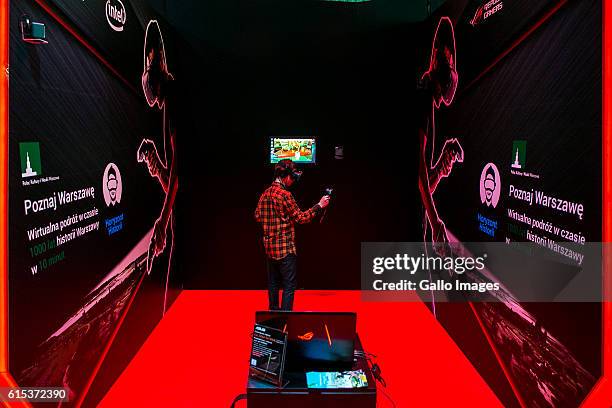 Player playing a game using the HTC VIVE goggles during the T-Mobile Warsaw Games Week on October 13, 2016 at EXPO XXI Exhibition Hall in Warsaw,...