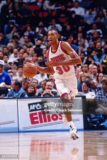 Kerry Kittles of the New Jersey Nets dribbles circa 1997 at the Contintental Airlines Arena in East Rutherford, New Jersey. NOTE TO USER: User...