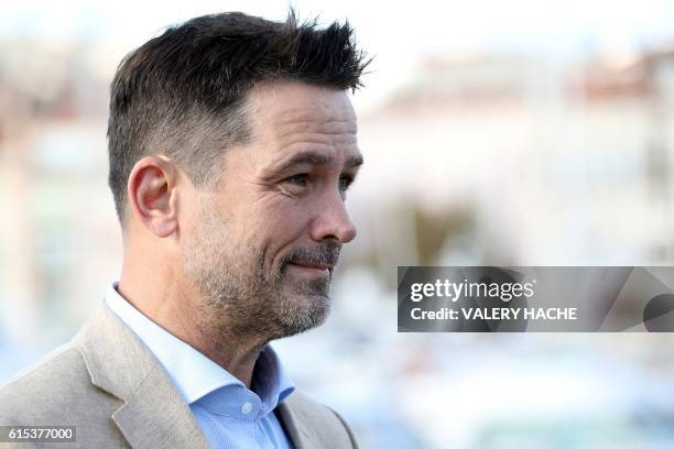 Actor Billy Campbell poses during a photocall for the TV serie "Cardinal" as part of the MIPCOM, the world's entertainment content market, on October...