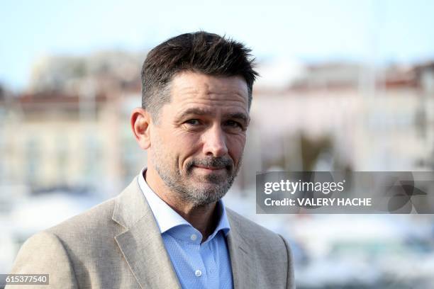 Actor Billy Campbell poses during a photocall for the TV serie "Cardinal" as part of the MIPCOM, the world's entertainment content market, on October...