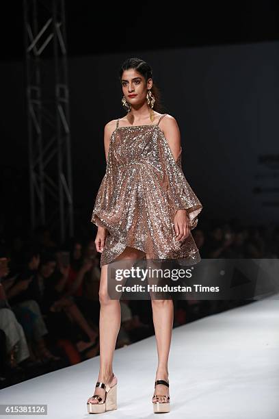 Model showcases creations by the designer Pria Kataria Puri during Amazon India Fashion Week Spring-Summer17 at NSIC exhibition complex on October...
