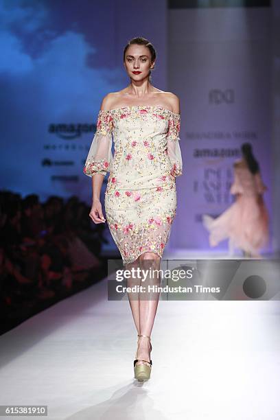 Model showcases creations by the designer Mandira Wirk during Amazon India Fashion Week Spring-Summer17 at NSIC exhibition complex on October 15,...