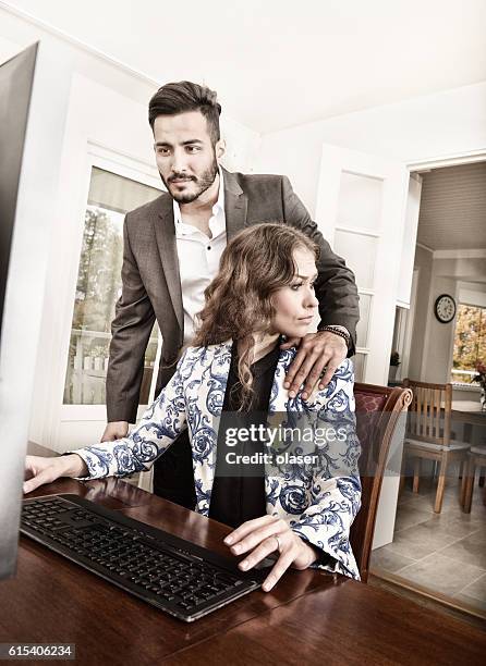 harrassed woman dislikes his hand. she wears ring. - colleague engagement stock pictures, royalty-free photos & images