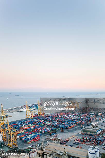 commercial dock with containers and cranes - tank barge stock pictures, royalty-free photos & images