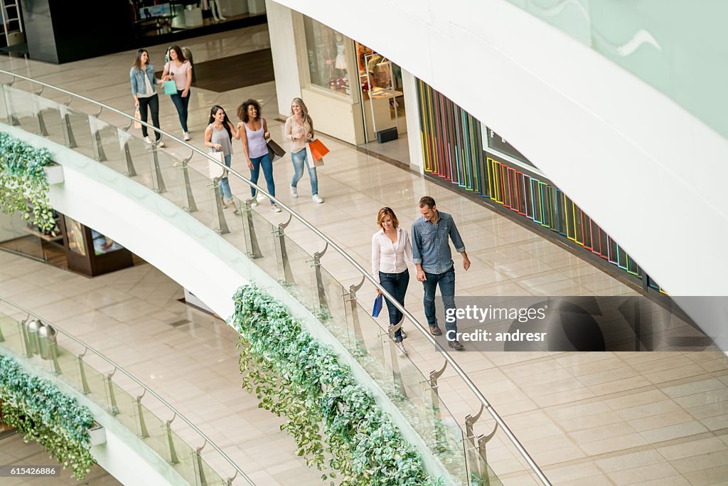 Happy people at the shopping center