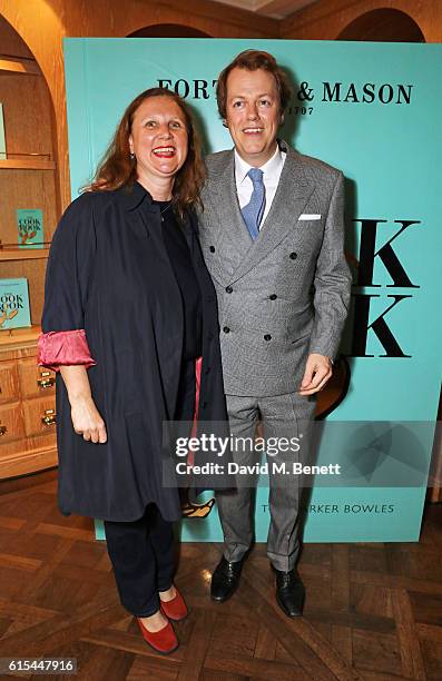 Angela Hartnett and Tom Parker Bowles attend the launch of "Fortnum & Mason: The Cook Book" by Tom Parker Bowles at Fortnum & Mason on October 18,...