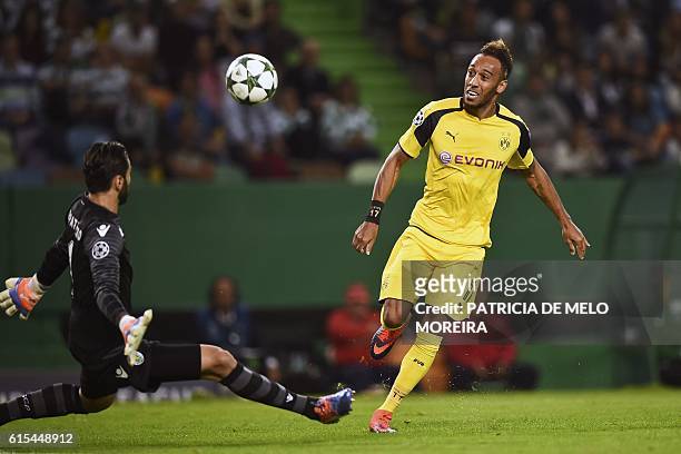 Dortmund's Gabonese forward Pierre-Emerick Aubameyang scores a goal during the UEFA Champions League football match Sporting CP vs BVB Borussia...