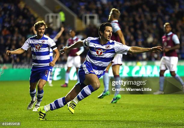 Yann Kermorgant of Reading celebrates scoring a goal off a rebounded penalty appempt during the Sky Bet Championship match between Reading and Aston...