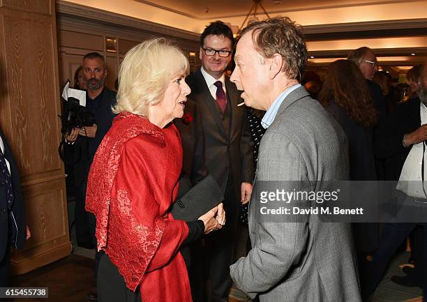 Camilla, Duchess of Cornwall, Ewan Venters, Fortnum & Mason CEO, and Geordie Greig attend the launch of "Fortnum & Mason: The Cook Book" by Tom...