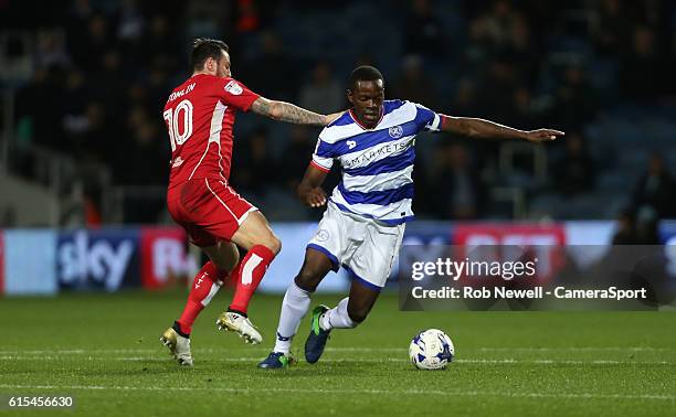 Queens Park Rangers' Nedum Onuoha and Bristol City's Lee Tomlin during the Sky Bet Championship match between Queens Park Rangers and Bristol City at...