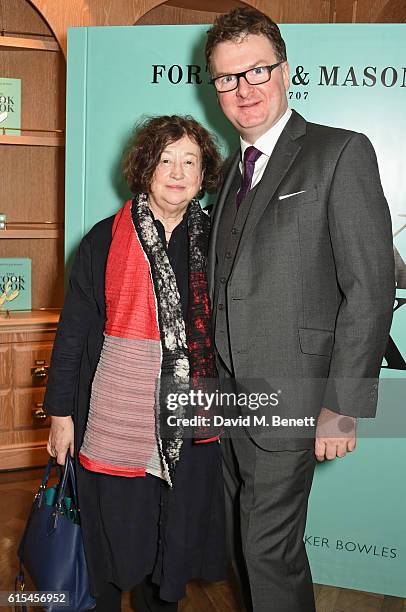Fay Maschler and Ewan Venters, Fortnum & Mason CEO, attend the launch of "Fortnum & Mason: The Cook Book" by Tom Parker Bowles at Fortnum & Mason on...