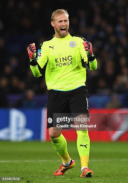 Kasper Schmeichel of Leicester City celebrates his team's win at the final whitsle during the UEFA Champions League Group G match between Leicester...