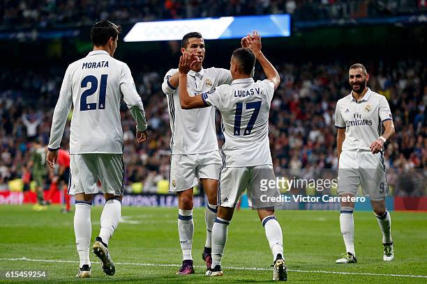 Lucas Vazquez of Real Madrid celebrates with his teammate Cristiano Ronaldo after scoring his team's fourth goal during the UEFA Champions League...