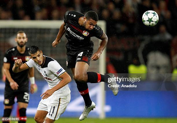 Erik Lamela of Tottenham Hotspur FC in action with Jonathan Tah of Bayer 04 Leverkusen during the UEFA Champions League group E soccer match between...