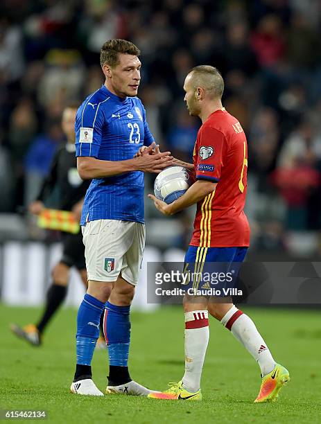 Andrea Belotti of Italy and Andreas Iniesta of Spain during the FIFA 2018 World Cup Qualifier between Italy and Spain at Juventus Stadium on October...