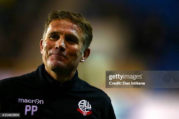 Phil Parkinson, manager of Bolton Wanderers smiles during the Sky Bet League One match between Millwall and Bolton Wanderers at The Den on October...