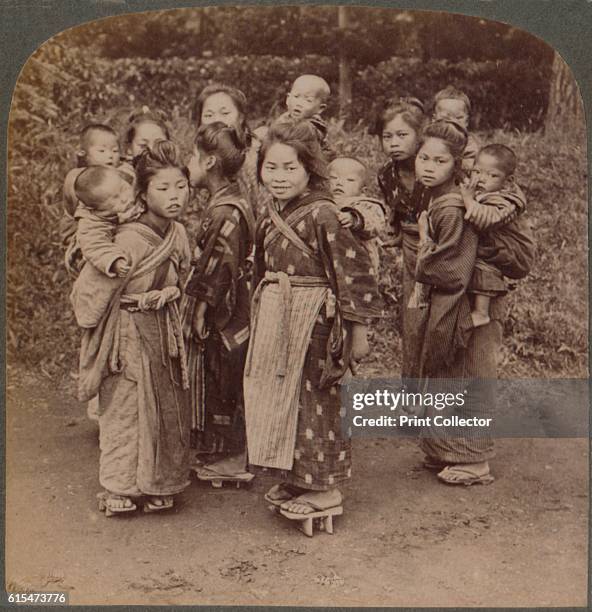 Big sisters and little brothers in the Land of the Rising Sun - Yokohama, Japan', 1904. From The Underwood Travel Library - Japan, [Underwood &...