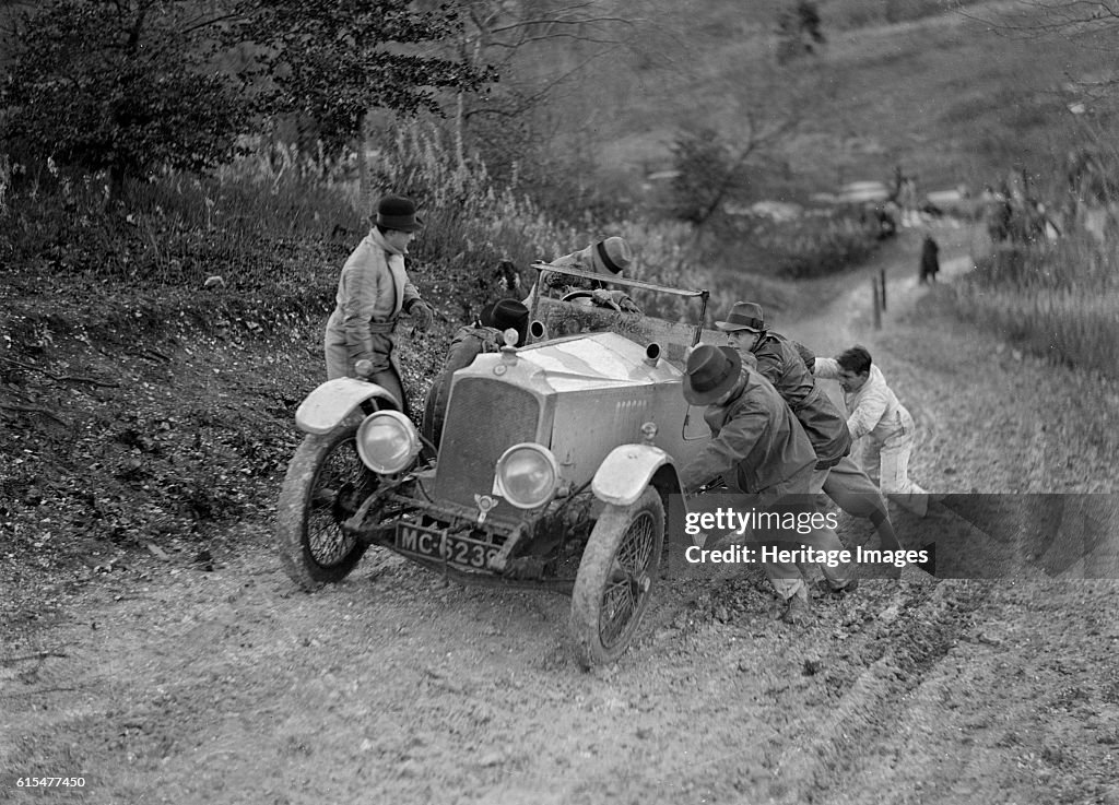 EA Beale's Vauxhall 30-98 Velox 4 seater receiving a push during the Inter-Varsity Trial, 1930