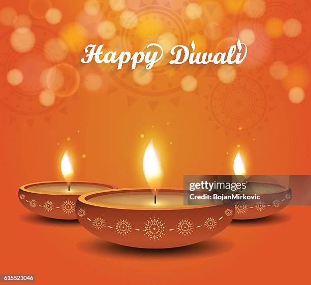 diwali poster on orange background with burning diya - diwali festival of lights stock illustrations