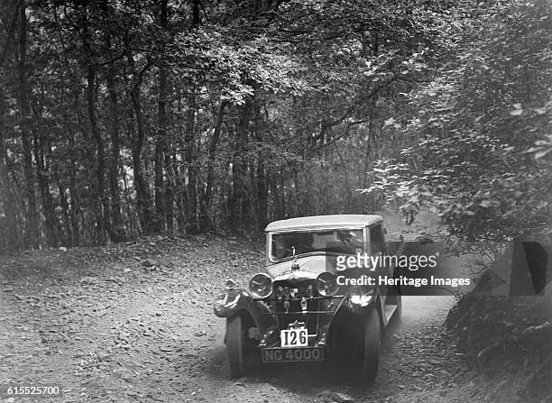 Riley competing in the B&HMC Brighton-Beer Trial, Fingle Bridge Hill, Devon, 1934. Riley Vehicle Reg. No. NG4000. Event Entry No: 126. Place: Fingle...