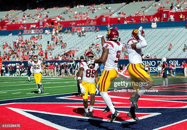 Trojans wide receiver JuJu Smith-Schuster and wide receiver Darreus Rogers celebrate a Schuster touchdown during the NCAA football game between the...