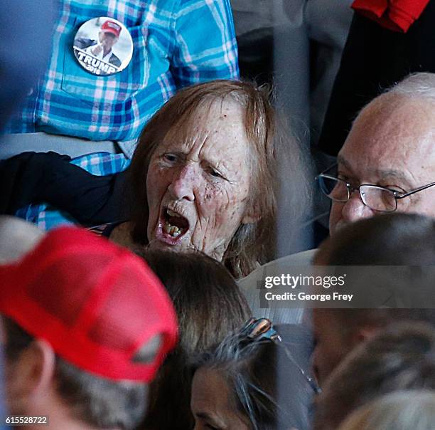 Supporter of Republican presidential candidate Donald Trump yells at a protester at a rally on October 18, 2016 in Grand Junction Colorado. Trump is...